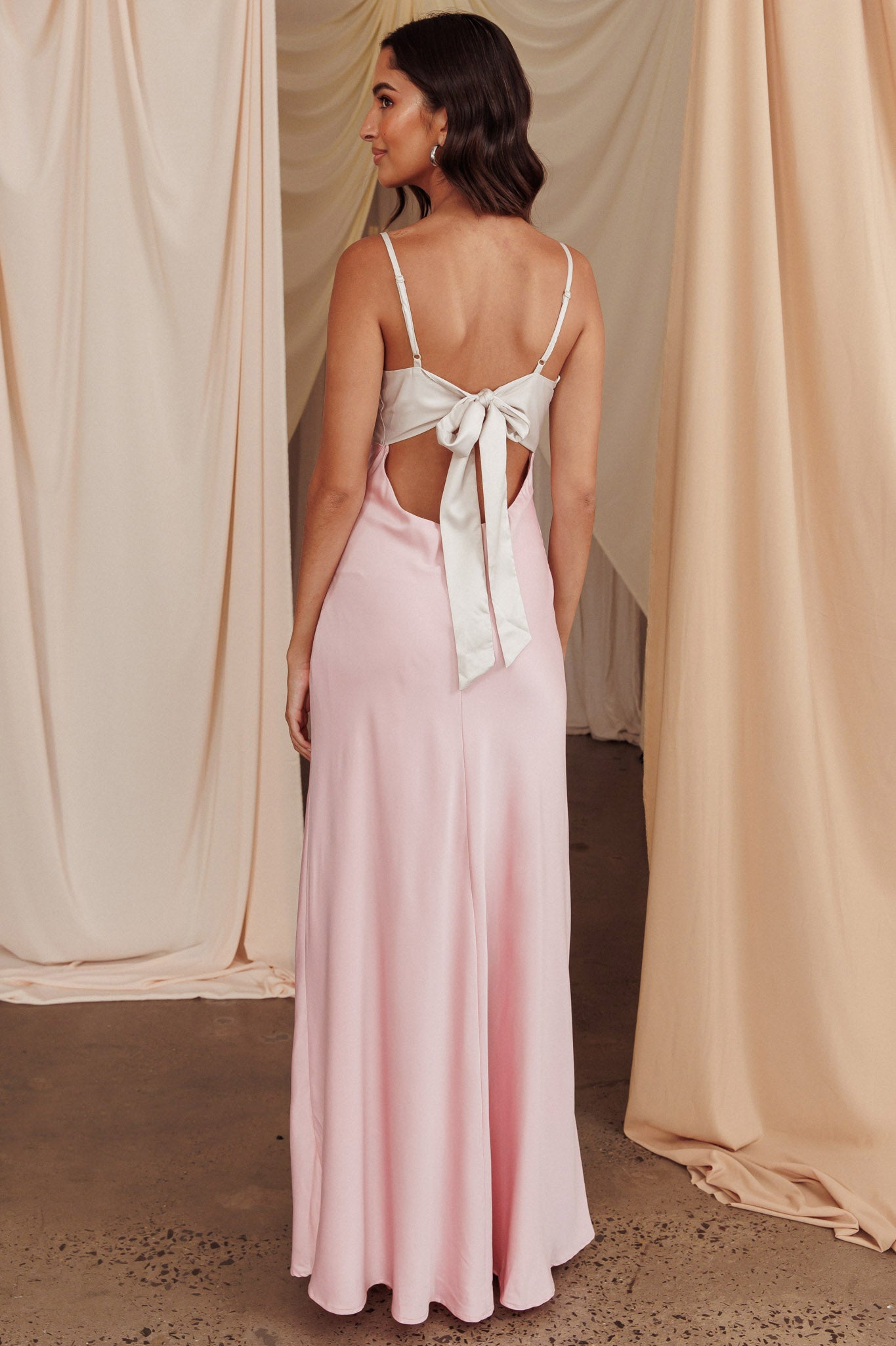 Shop the Bayleigh Low Bow Tie Back Dress Pink