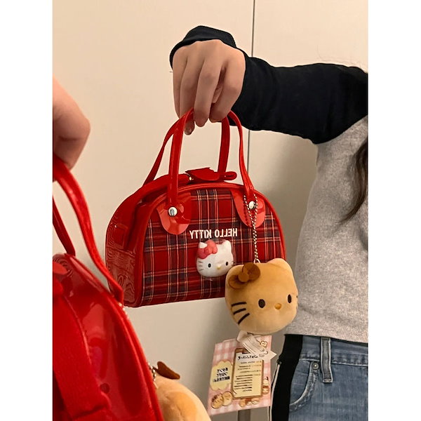 Qoo10] ハローキティkt片肩チェックバッグ昭和レ