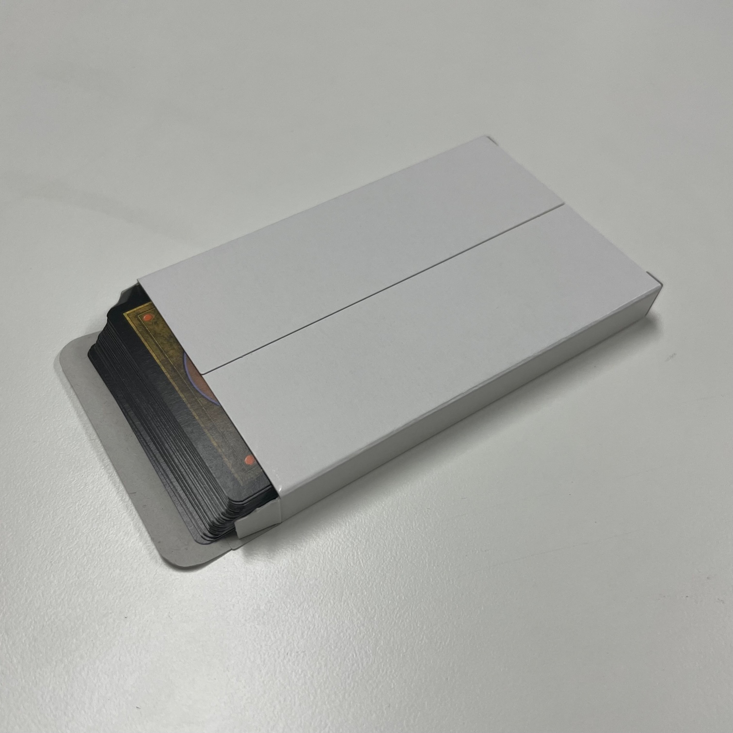 トレカ自動販売機 紙箱 - 株式会社泉美什器