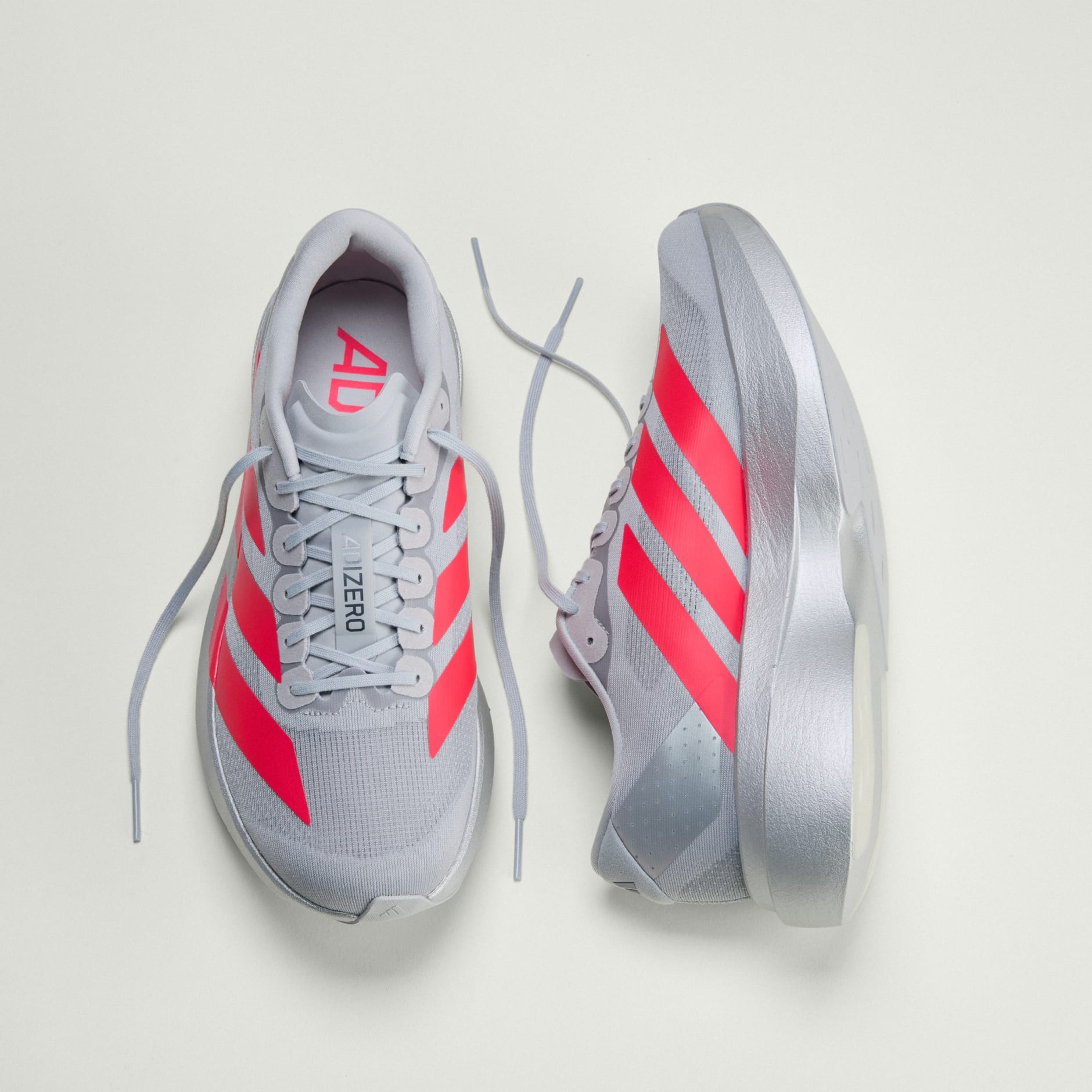 Shoes - Adizero EVO SL Shoes - Silver | adidas Oman