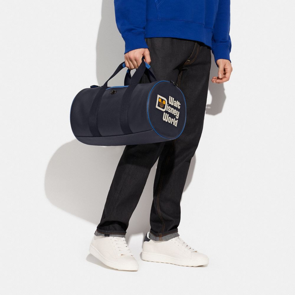 公式】COACH – コーチ | 【DISNEY x COACH】ダッフル ウィズ ウォルト